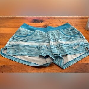 Offers welcome Nike workout shorts. Teal color. Size Medium. Great condition